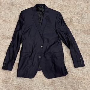 Dolce and Gabbana sharkskin suit.